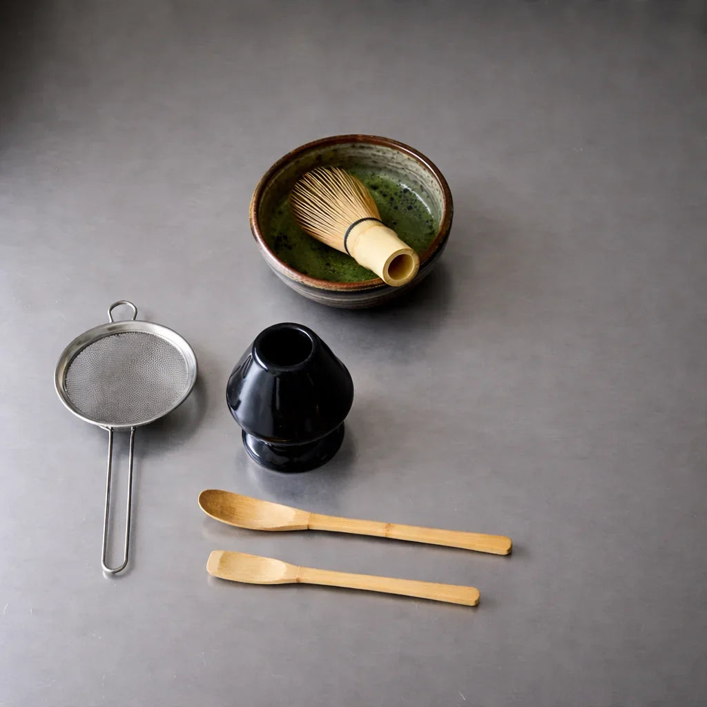 Matcha set accessories — bamboo chasen whisk, chawan bowl, and sifter